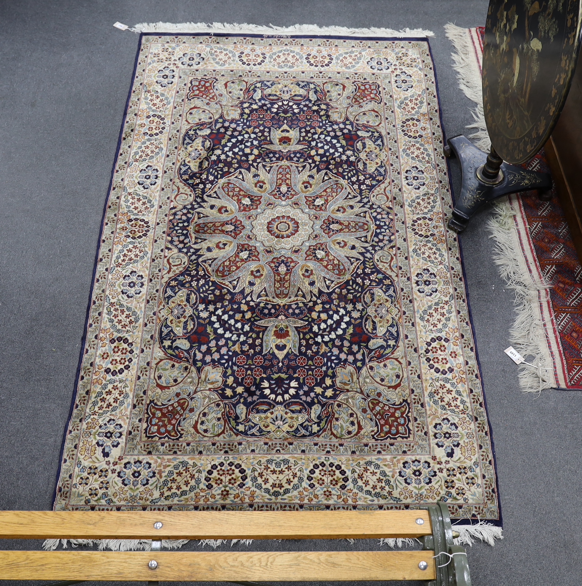 A North West Persian blue ground rug, 240 x 140cm